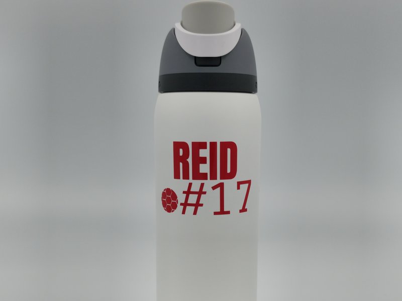 White water bottle personalized with a red vinyl name, soccer ball, and jersey number